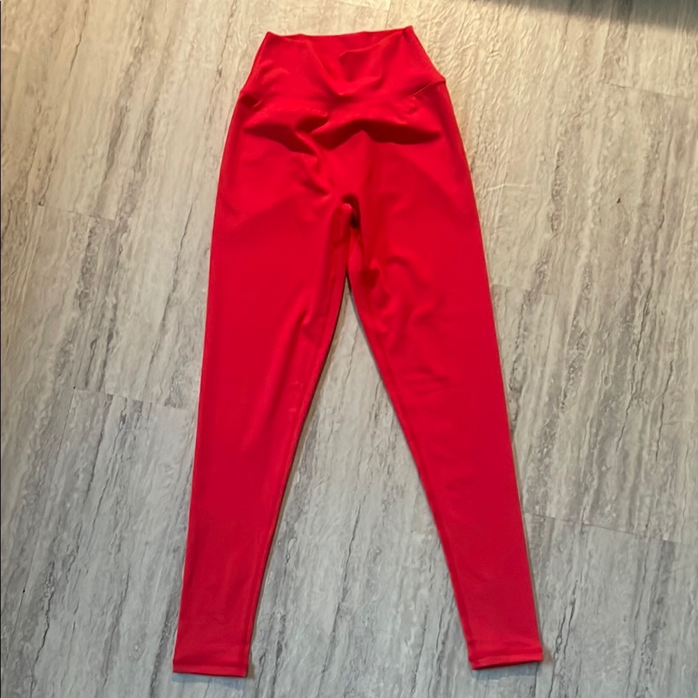 Ptula Sierra legging in color Red hot.Brand new without tags, never worn. Size S